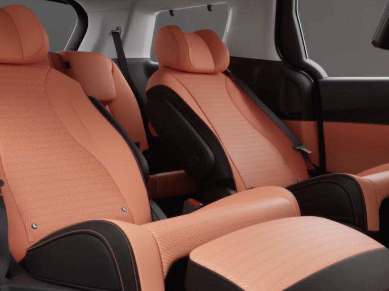 The 2026 Kia Carnival is a three-row minivan available in seven exterior colors with seating for up to eight passengers.